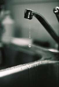 dripping-kitchen-sink-faucet